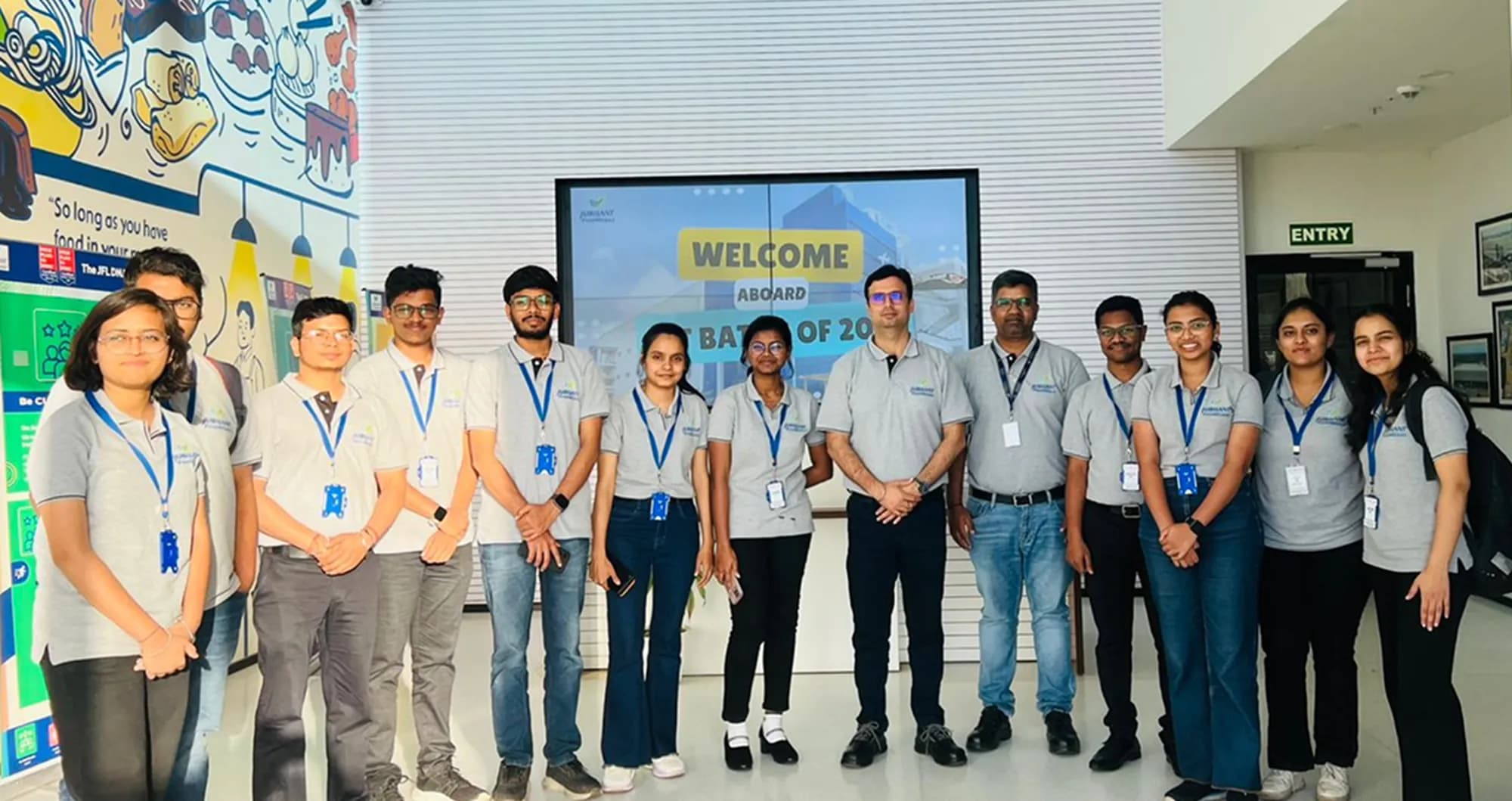 Graduate engineering trainees celebrating a milestone